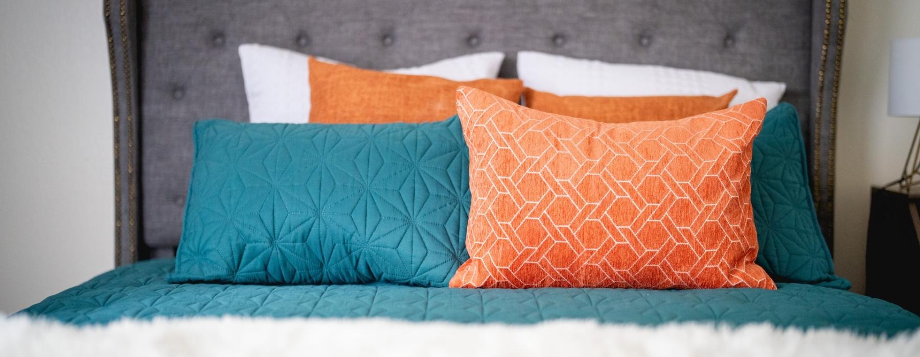 a bed with pillows