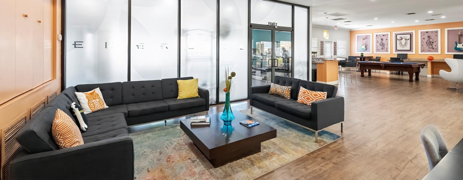 a living room with a large glass wall